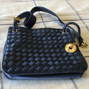 Bottega Veneta blue shoulder silk bag.